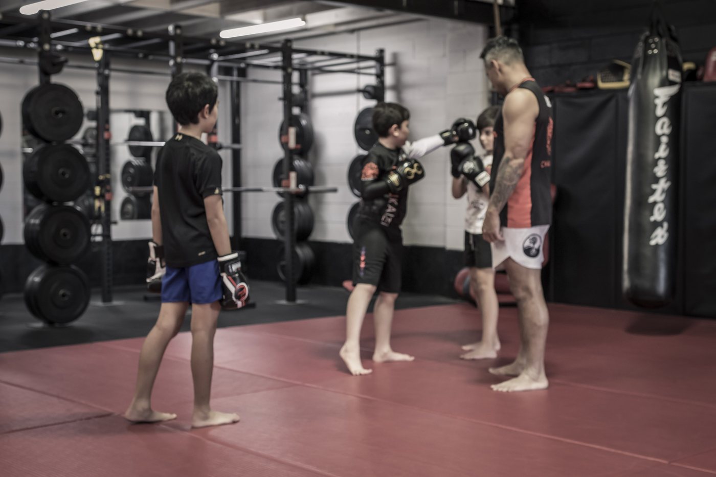 Suasday Chau coaching a kids martial arts class at Chau Kaizen in Prospect, Adelaide
