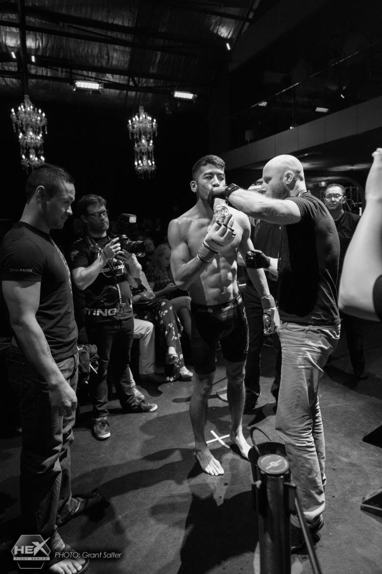 Suasday Chau cornering a Chau Kaizen fighter at HEX Fight Series