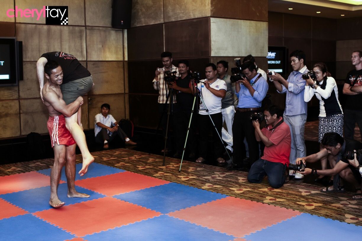 Suasday Chau demonstrating for Cambodian press at the ONE Championship open workout in Phnom Penh